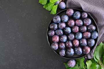 Wall Mural - Fresh plums on plate