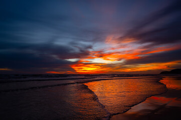 Wall Mural - colorful sunset on the beach.beautiful sunset over the sea.dramatic sky on twilight time and reflect