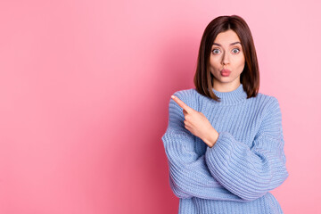 Wall Mural - photo of charming impressed person direct finger empty space blank isolated on pink color background