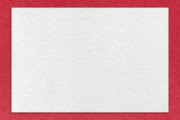 Texture of craft white color paper background with red border, macro. Structure of vintage dense kraft ruby cardboard