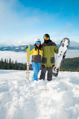 Canvas Print - couple snowboarder ans skier portrait