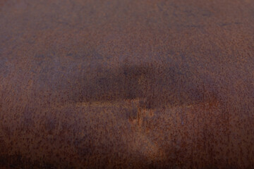 Grunge is an old sheet of metal with rust. dent in the center of the background texture surface