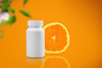 Sticker - Medical bottle of pills and fresh citrus orange