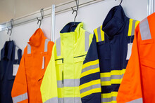 Jackets With Reflective Stripes - Road Workers Special Clothing. Workwear, Protection Clothing And Outfit Concept