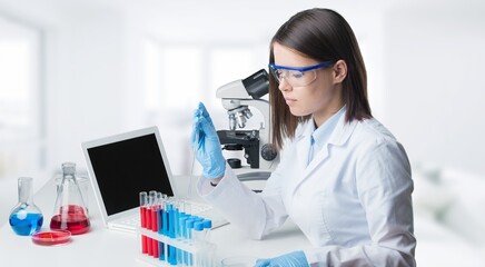 Wall Mural - Happy young pharmacist do tests at laboratory