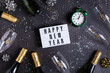 Happy New Year greeting card, champagne glasses and bottles, confetti