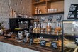 © Fxquadro - Shot of bar of coffee shop there are sweets croissants and coffee in daytime.