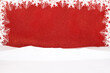 White snowflakes on red shiny background with snow. Frame for  announcement. Christmas, New Year. Copy space