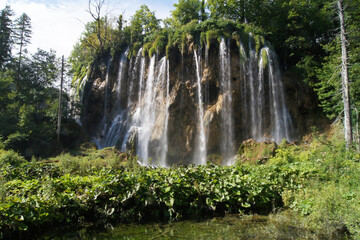 Sticker - Plitvice Lakes National Park is a 295 square kilometer forest reserve located in central Croatia