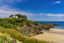 The Rocky Headland And Beach At Chapel Point (near Portmellon) In Cornwall. This Beautiful Beach Is On The South West Coast Path Between Mevagissey And Goran Haven