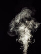 © photostory - White smoke on a black background, rising in balls as an abstract effect