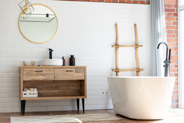 Modern bright loft scandi style bathroom, freestanding bath