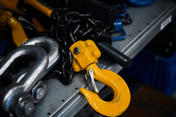 Different rigging equipment on table in light workshop