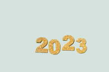Golden Glitter Of The Numbers 2023 Is A Symbol Of The Coming New Year. Top View, Copy Space