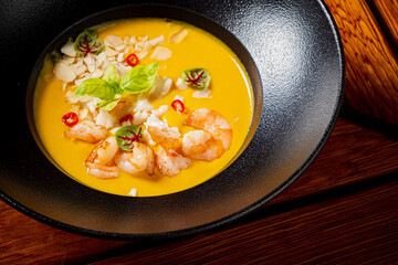 Sticker - pumpkin soup with shrimps and herbs