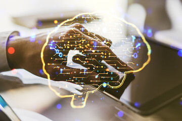 Wall Mural - creative artificial intelligence concept with human brain hologram and finger clicks on a digital ta