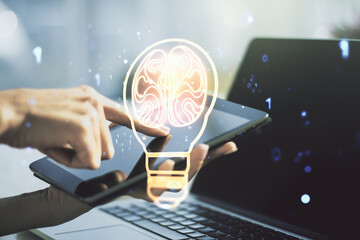 Wall Mural - creative idea concept with light bulb and human brain illustration and with finger clicks on a digit