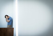 © Caia Image - Frustrated businessman with head in hands