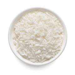 Wall Mural - Coconut flakes in white bowl isolated on white. Top view.