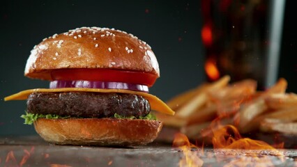 Sticker - Super slow motion of stacking hamburger pieces with fire. Filmed on high speed cinema camera, 1000 fps. Speed ramp effect.