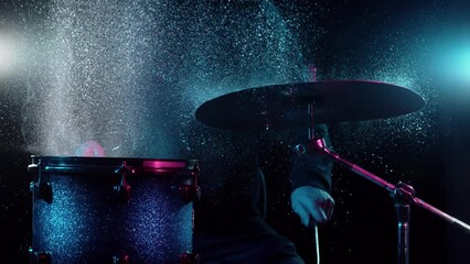 Sticker - Super slow motion of drummer banging on cymbal and drum with water splashing. Filmed on high speed cinema camera , 1000 fps.