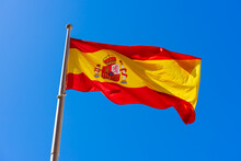 Spanish Flag On Blue Sky