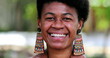 © Marco - Black woman laughing and smiling. African person real life laugh and smile