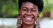© Marco - African woman portrait face close-up standing outside. happy smiling black lady