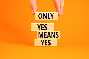 Wall Mural - Only yes means yes symbol. Concept words Only yes means yes on wooden blocks on a beautiful orange table orange background. Businessman hand. Business, psychological only yes means yes concept.