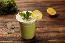 Lemon Mint Juice With Lime Slice And Mint Leaves Served In Glass Side View On Wooden Table Morning Meal