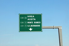 Green Highway Sign With Italy Location Names In Italy