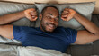 © Prostock-studio - Top View Of Black Man Sleeping Lying In Bedroom, Panorama