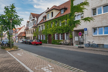 Wall Mural - street with plants on the walls  in the old town