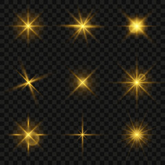 Fototapete - Glowing star light effect collection. Light effect of sparkling stars and bright flashes. Golden sparkles and particles with glowing light. Golden flickers isolated on transparent background. Vector
