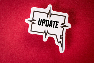 Wall Mural - Update. Text and speech bubble on red background
