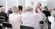 © ASDF - Rear view of a senior people listening a lecture