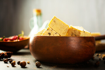 Wall Mural - Bowl with tasty tofu cheese on table