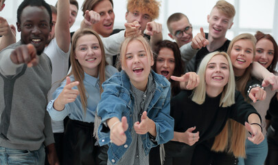 Wall Mural - group of cheerful young people pointing at you