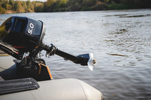 Outboard Motor On A Boat Over Water