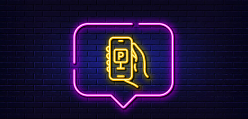 Wall Mural - Neon light speech bubble. Parking app line icon. Hand hold phone sign. Cellphone with screen notification symbol. Neon light background. Parking app glow line. Brick wall banner. Vector