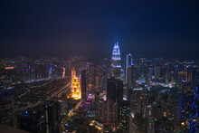 Kuala Lumpur, Malaysia, 2019. Petronas Twin Towers At Night With View On City Lights