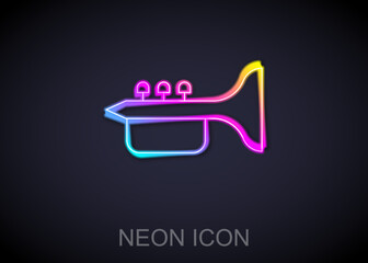 Canvas Print - Glowing neon line Trumpet icon isolated on black background. Musical instrument trumpet. Vector