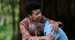 © Marco - Black woman consoling crying depressed man