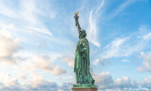 Statue Of Liberty In New York City, USA With Blue Sky Background