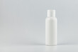 © photo_gonzo - cosmetic flacon tube on white background. white unbranded cosmetic flacon mock up. branding identity flacon mockup concept. blank label