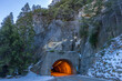 Entrance to the Tunnel View tunnel in Yosemite National Park with snow on surroundings