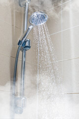 Wall Mural - contrast shower with flowing water and steam