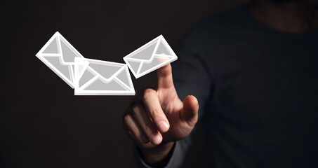 Emails. Man tapping on the screen