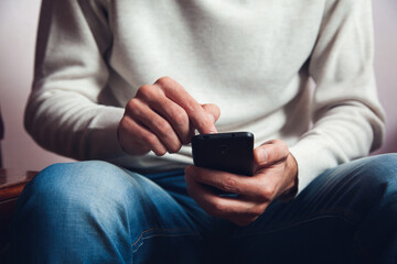 Canvas Print - Man tapping on phone screen