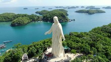 4k Aerial Drone Shot Of Statue Of Jesus Christ In Pangasinan Alaminos Hundred Islands Philippines 